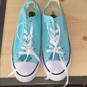 Baby blue low top converse sneakers, never worn.
